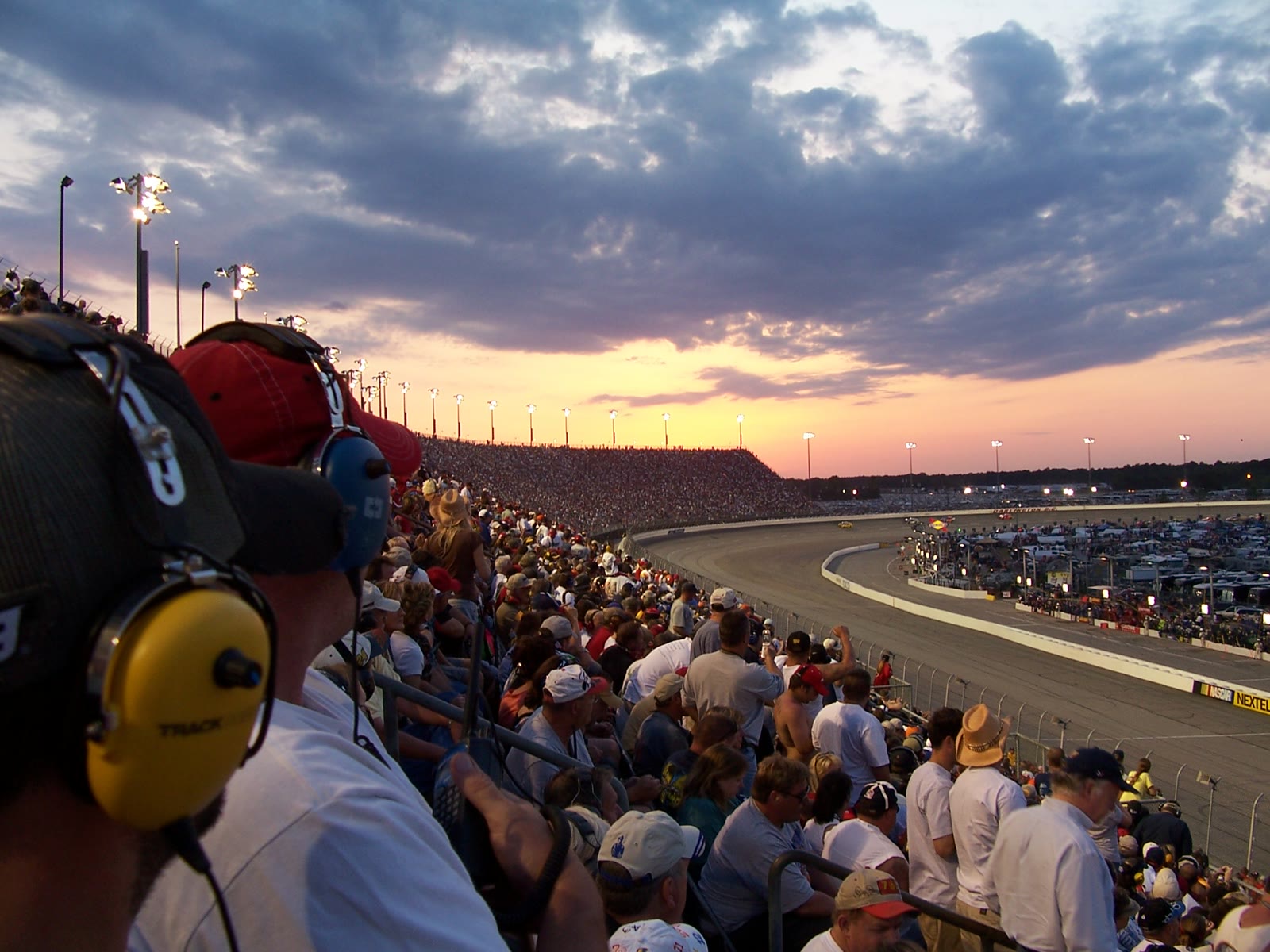Stock cars racing on the historic Darlington Raceway surface during a NASCAR event